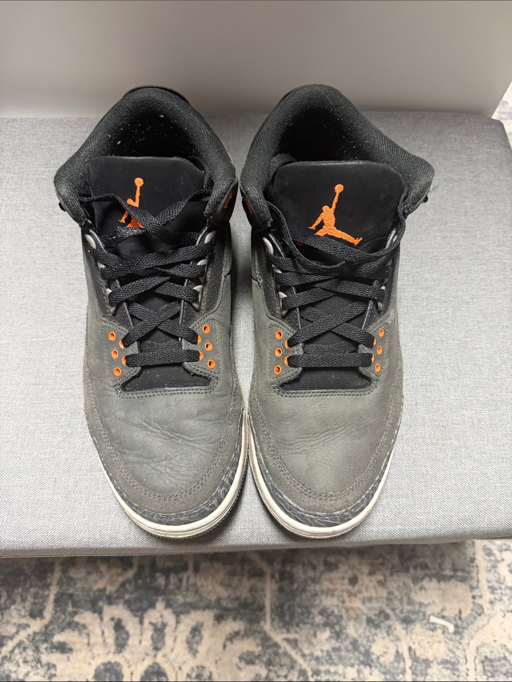 Retro 3 Jordan Men’s Black Sneakers with Orange Jumpman Accents